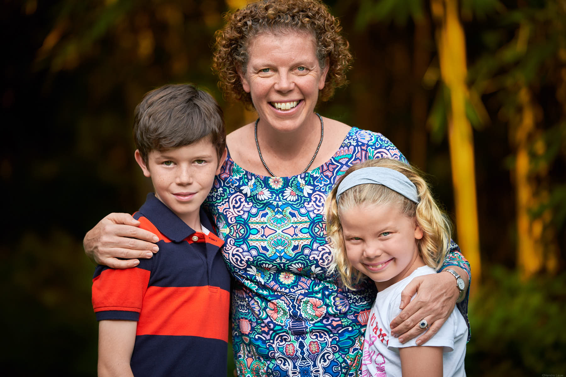 Mother Son and Daughter at Singapore Botanic Gardens. Photography by Hendra Lauw.