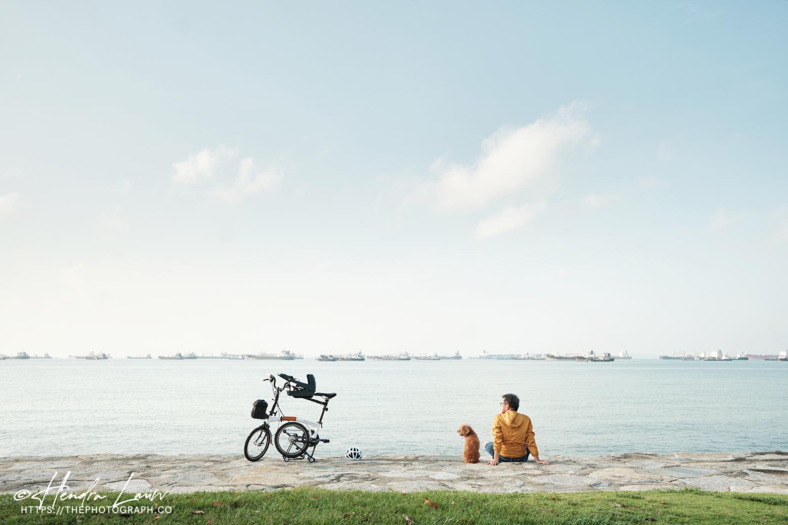 Photographer and his bike and poodle