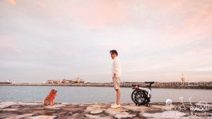 Goblin Korean drama inspired photoshoot of a photographer his dog and bike during sunset at Marina East Breakwater Singapore