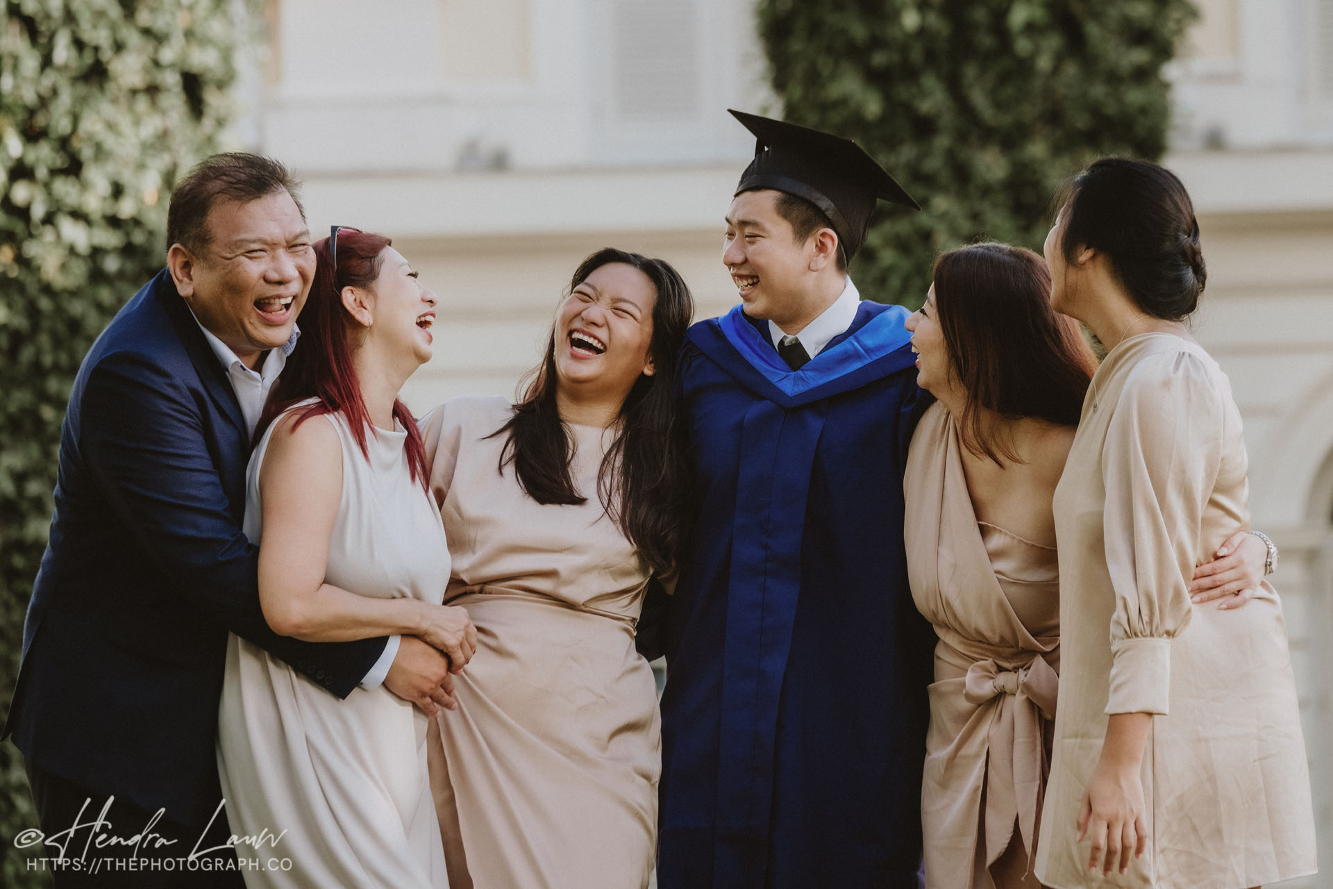 Candid outdoor graduation and family photoshoot at Asian Civilisations Museum
